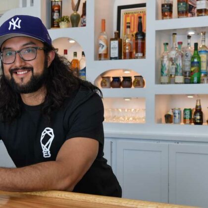 Joshua Gonzalez stands behind his bar at FOKO restaurant