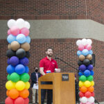 Thomas Teague speaking at the College Pride Banner Event Apr. 2021