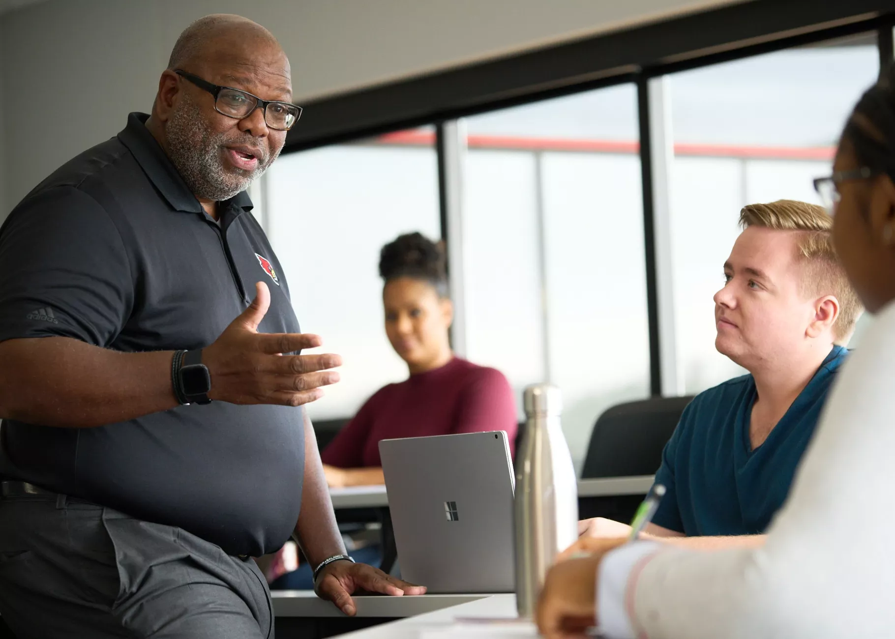 Professor Michael Wade teaching students in the College of Business.