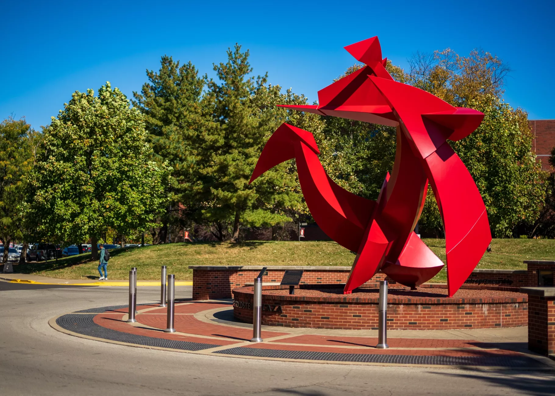 Wide-angle of the Big Red sculpture outside of the College of Business