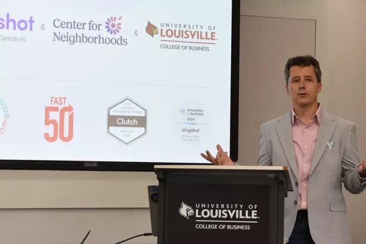 Man at podium speaking