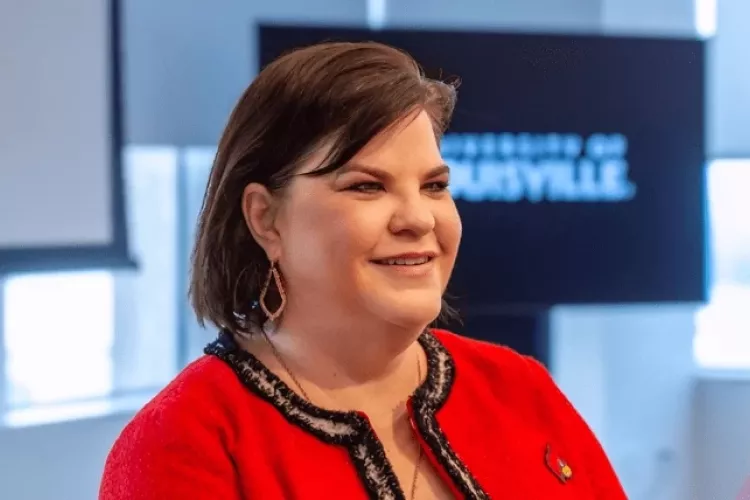 Amy Henley in Cardinal red at a College of Business event