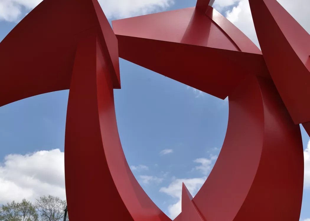 University of Louisville College of Business campus art statue, Big Red on a sunny day