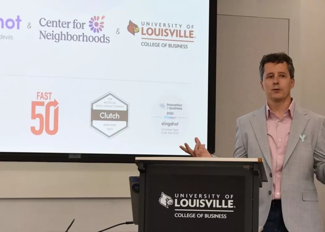 Man at podium speaking