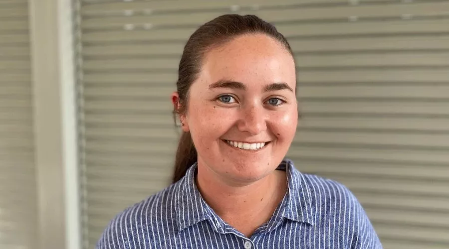 Headshot of a woman smiling.