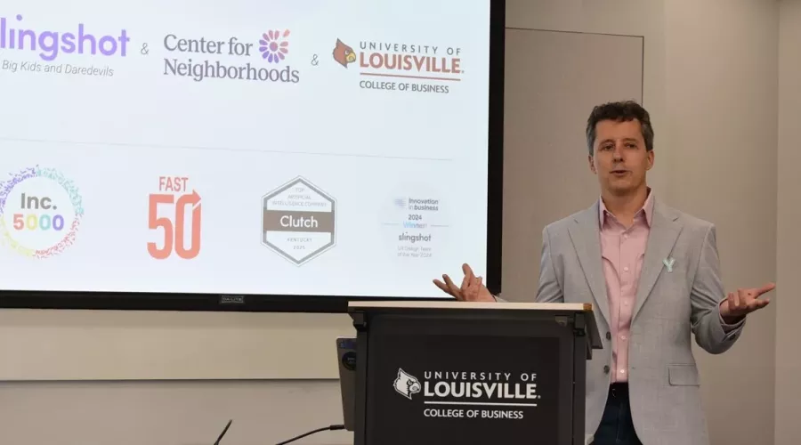 Man at podium speaking