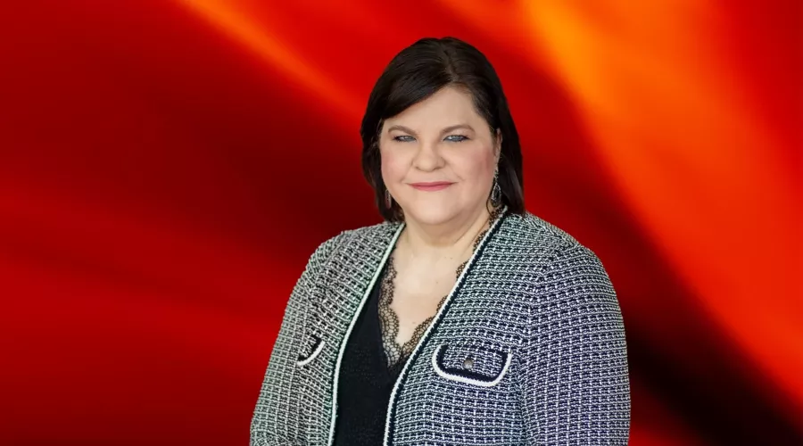 Dean Amy Henley on red essence background